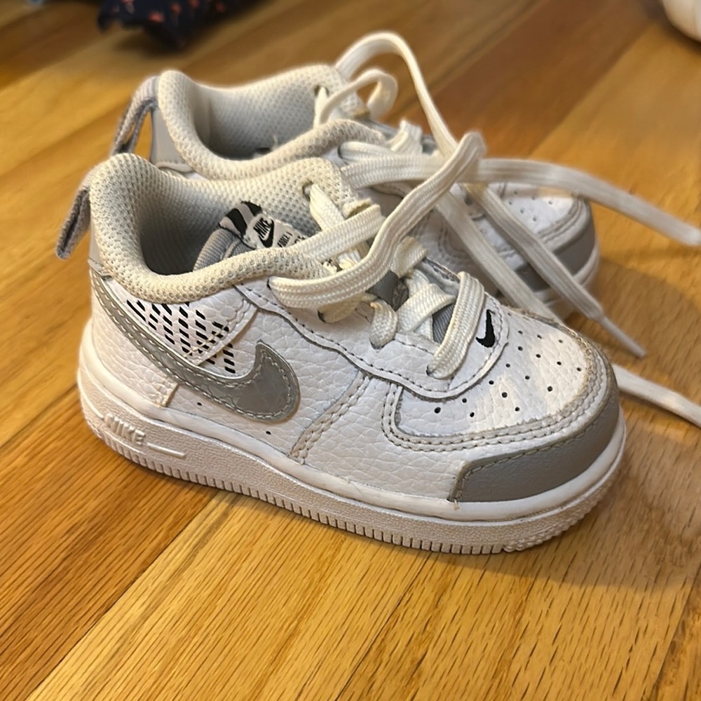 Nike White and Gray Sneakers with Classic Design